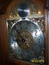 Colonial grandfather clock face