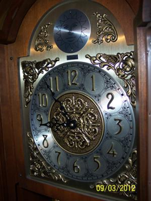 Colonial grandfather clock face
